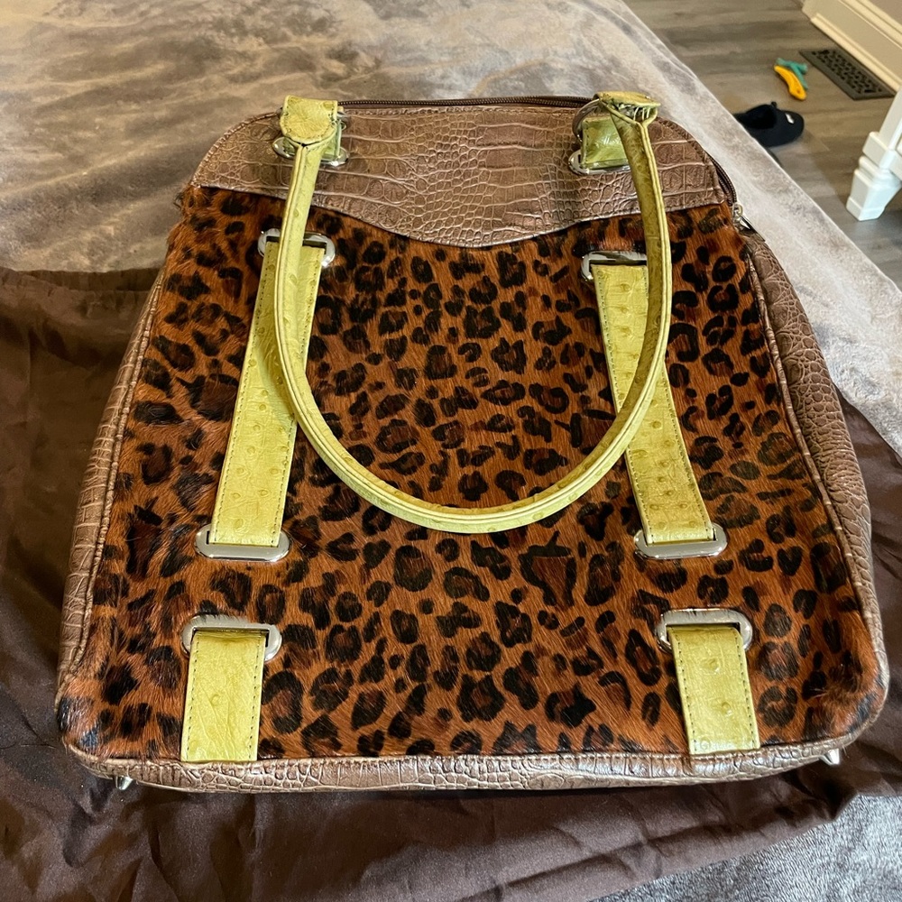 Leather and animal print fur handbag